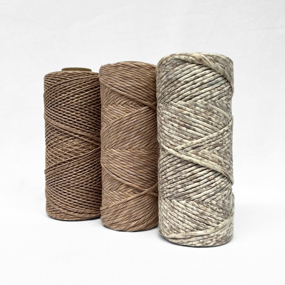 1.5mm 4mm mixed cotton string next to 4mm confetti string in warm brown and grey colour way  500g rolls