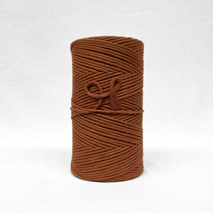 3mm cotton string in brown sugar warm autumn brown on white wall
