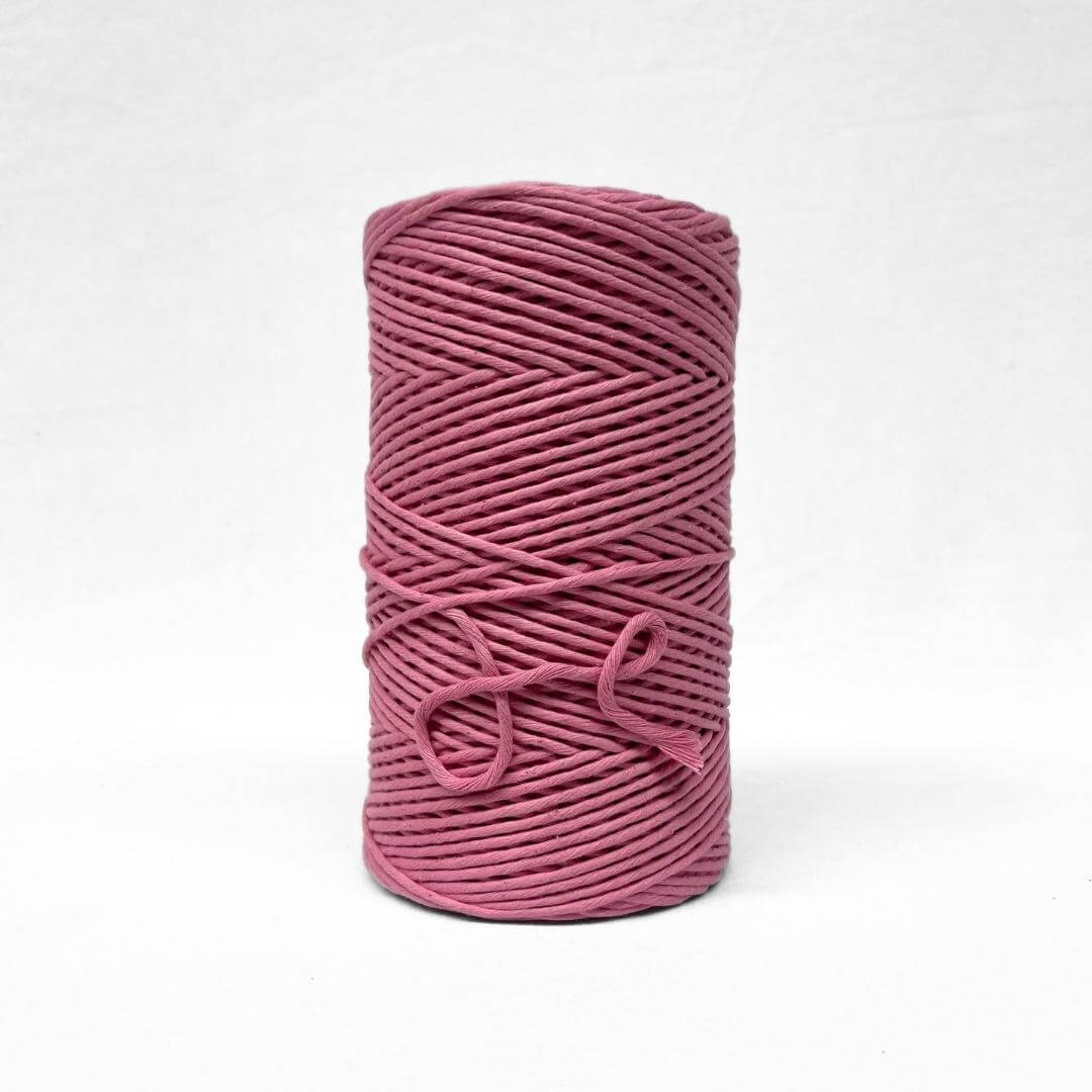 3mm cotton string in musk pink for weaving and macrame on white background