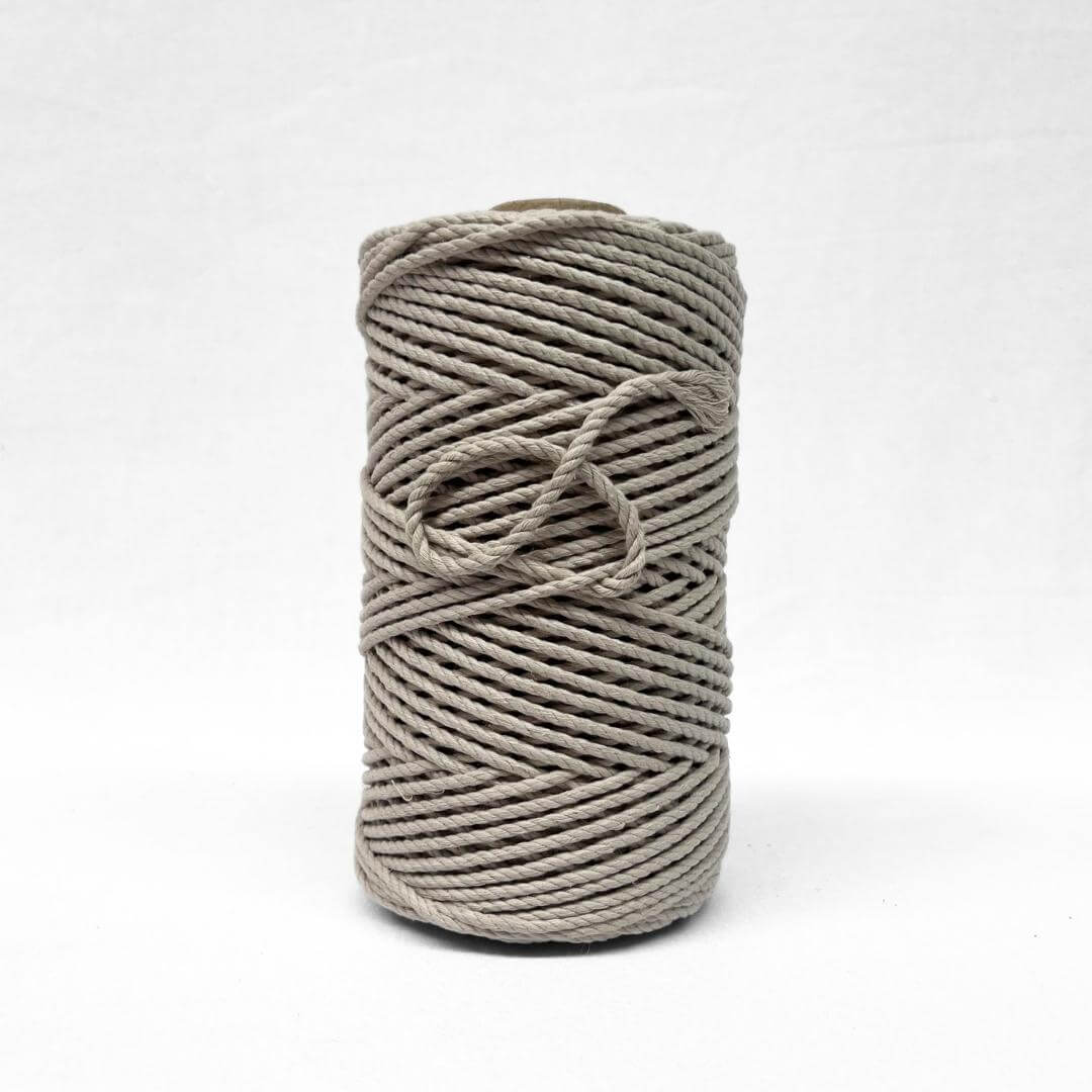 cool muted brown cotton 4mm rope in image with single roll on white background