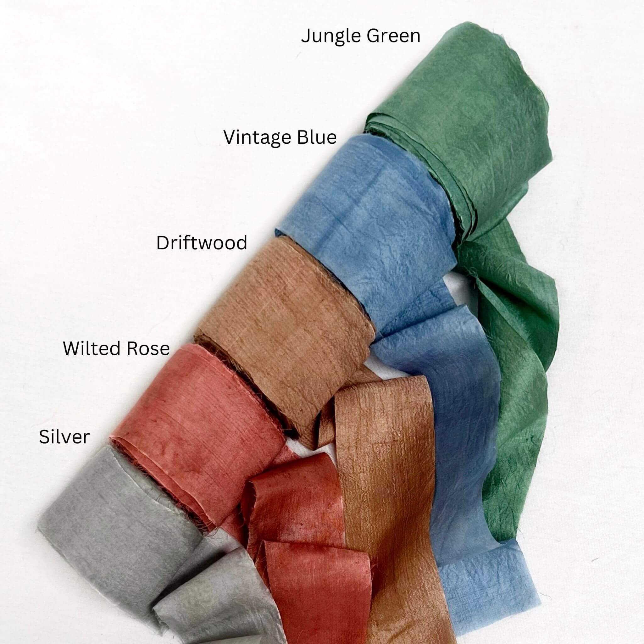 dark green vintage blue driftwood brown rose red silver grey wide silk ribbon rolls group photo for diy craft on white wall