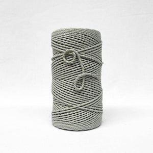 soft muted misty green cotton rope with small brushed out piece to show product softness and texture on white back ground