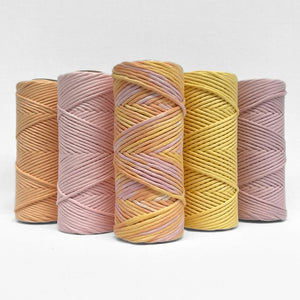 sherbet macrame string standing side by side to complementing colours of macrame string