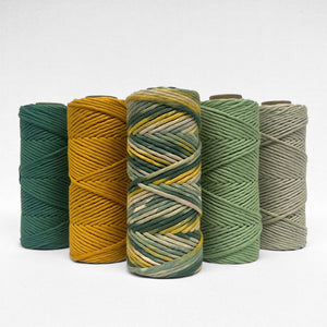 combination photo showing roll of wattle hand painted with four matching solid colours in yellow green tones on white background