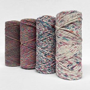 combination photo showing fours roll that demonstrate the different variation of harlequin cotton cord including 1.5mm mixed string 4mm mixed string and confetti 4m string all standing side by side on white background