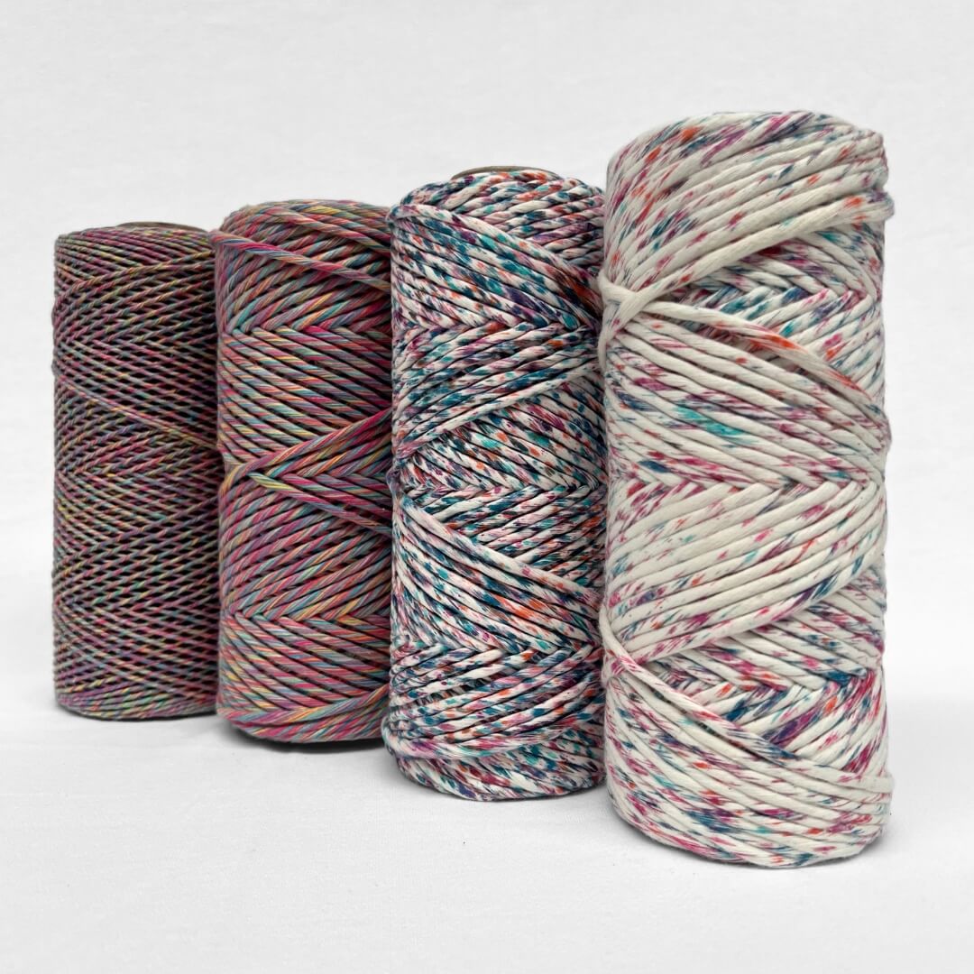 combination photo showing fours roll that demonstrate the different variation of harlequin cotton cord including 1.5mm mixed string 4mm mixed string and confetti 4m string all standing side by side on white background