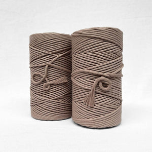 two quartz light brown rolls on white background