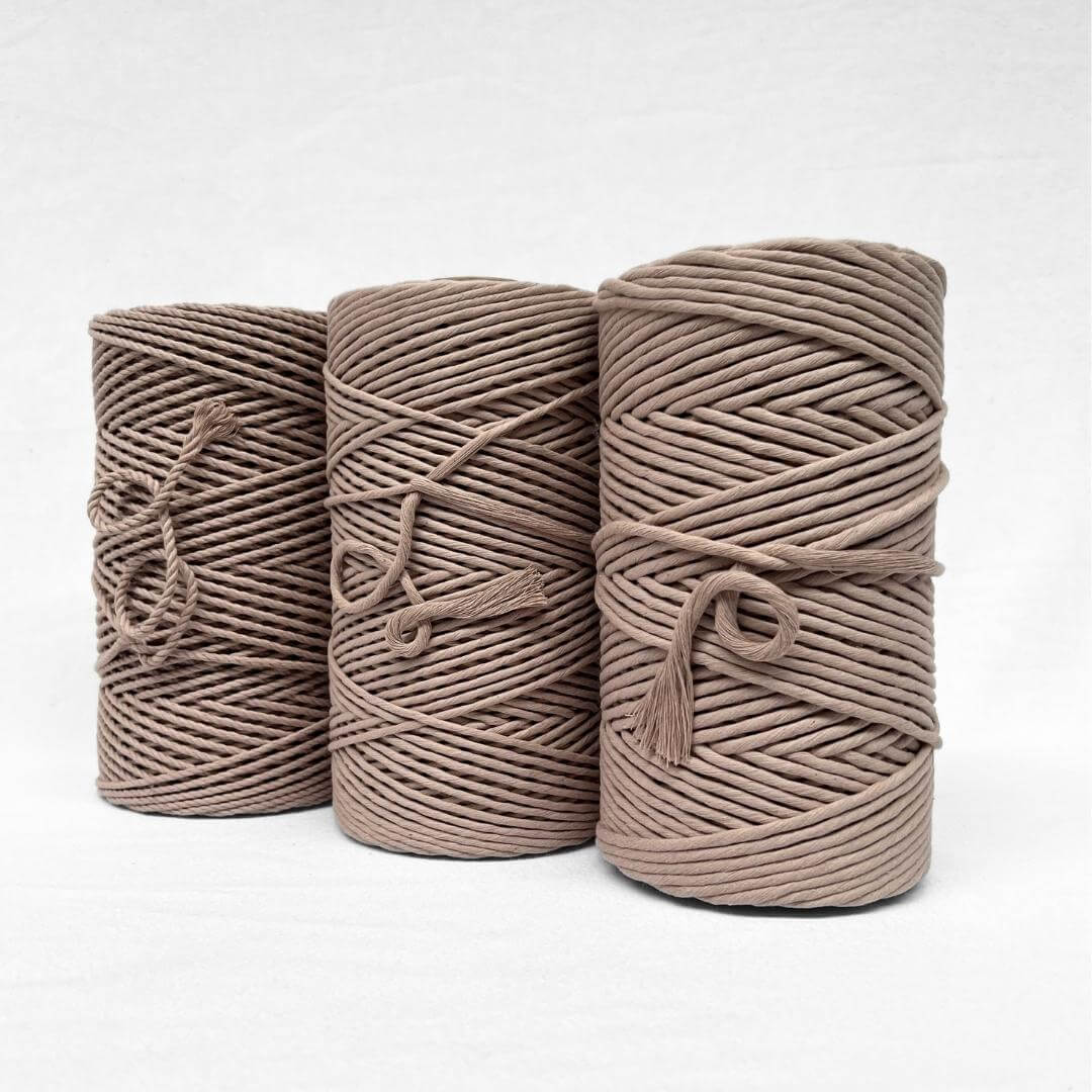 quartz soft brown 4mm rope standing alone on white background with small brushed out piece showing cotton softness