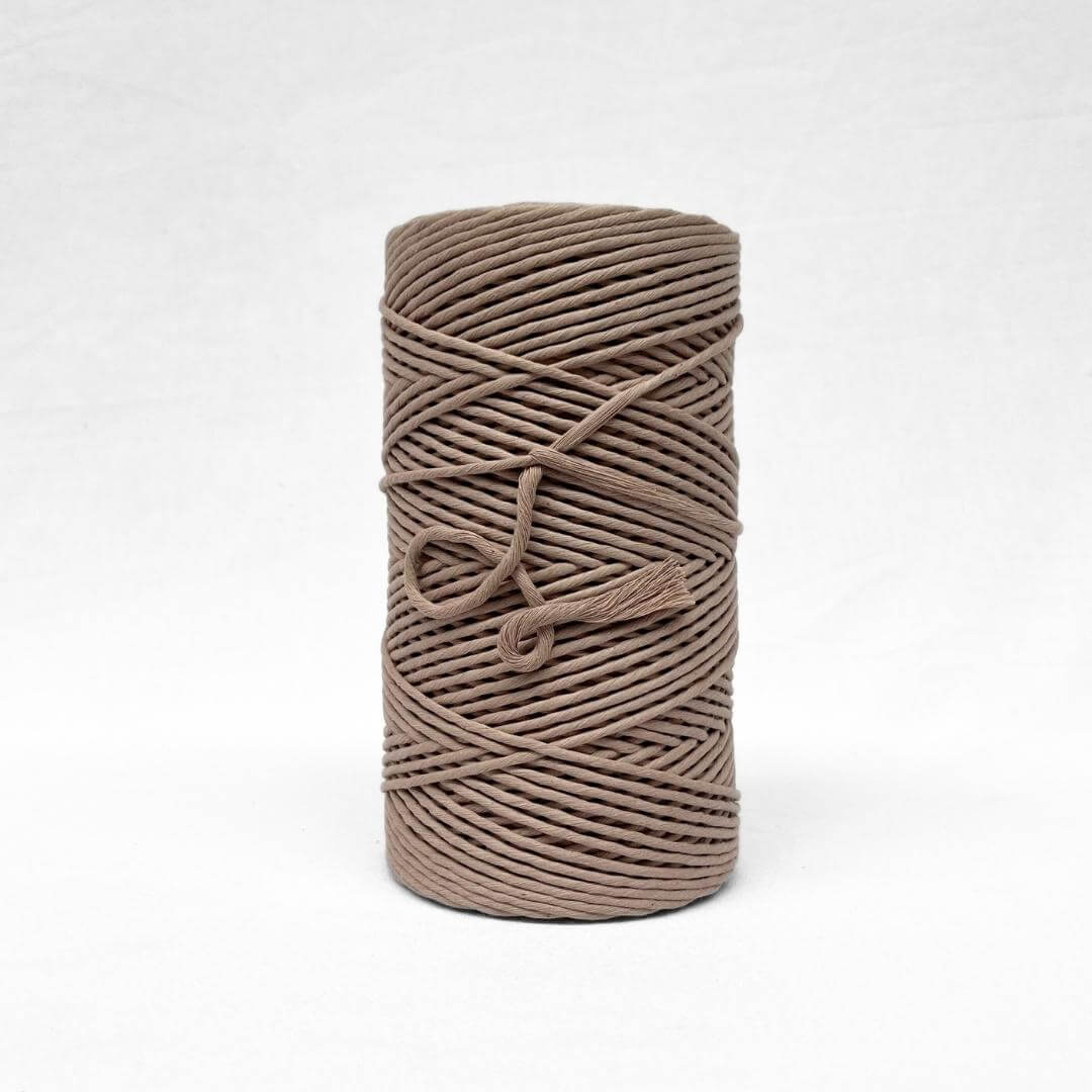 3mm quartz light brown cotton string on white backdrop showing texture