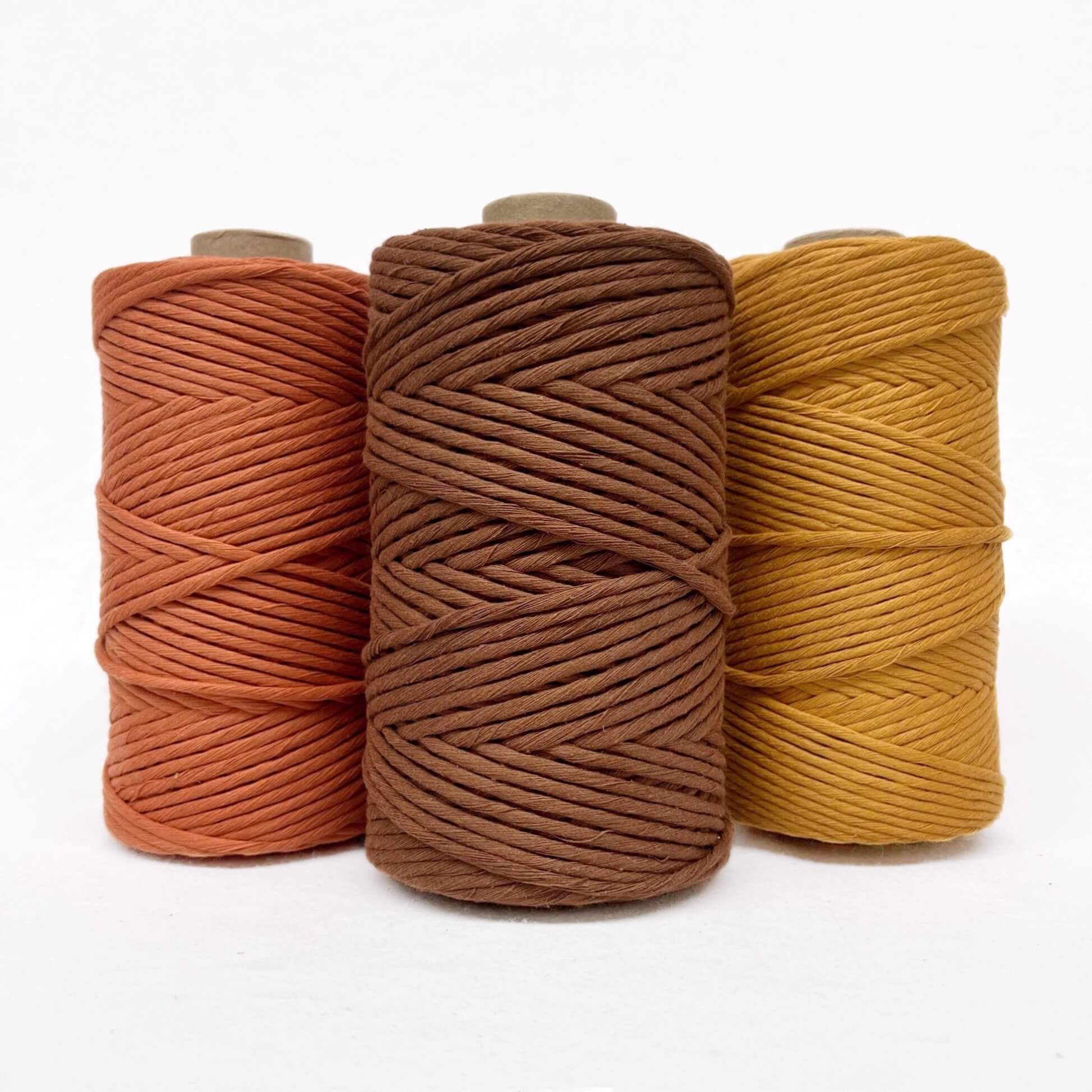 burnt orange chocolate mustard yellow cotton cord group photo on white background