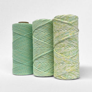 Lime Splice in three variants, 1.5mm 4mm and confetti 4mm standing on white wall