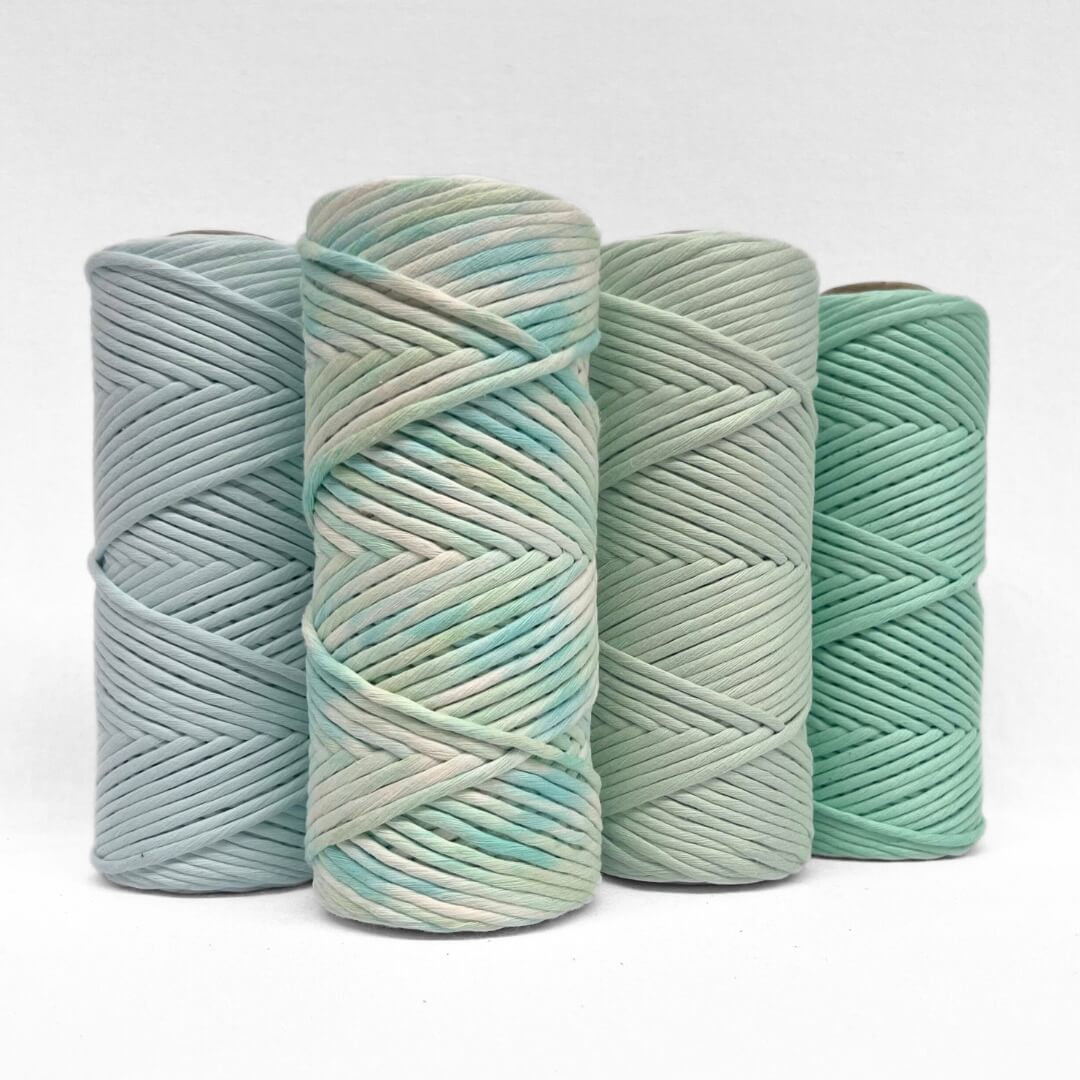 blue frost ocean spray mint and spring green macrame string on white background