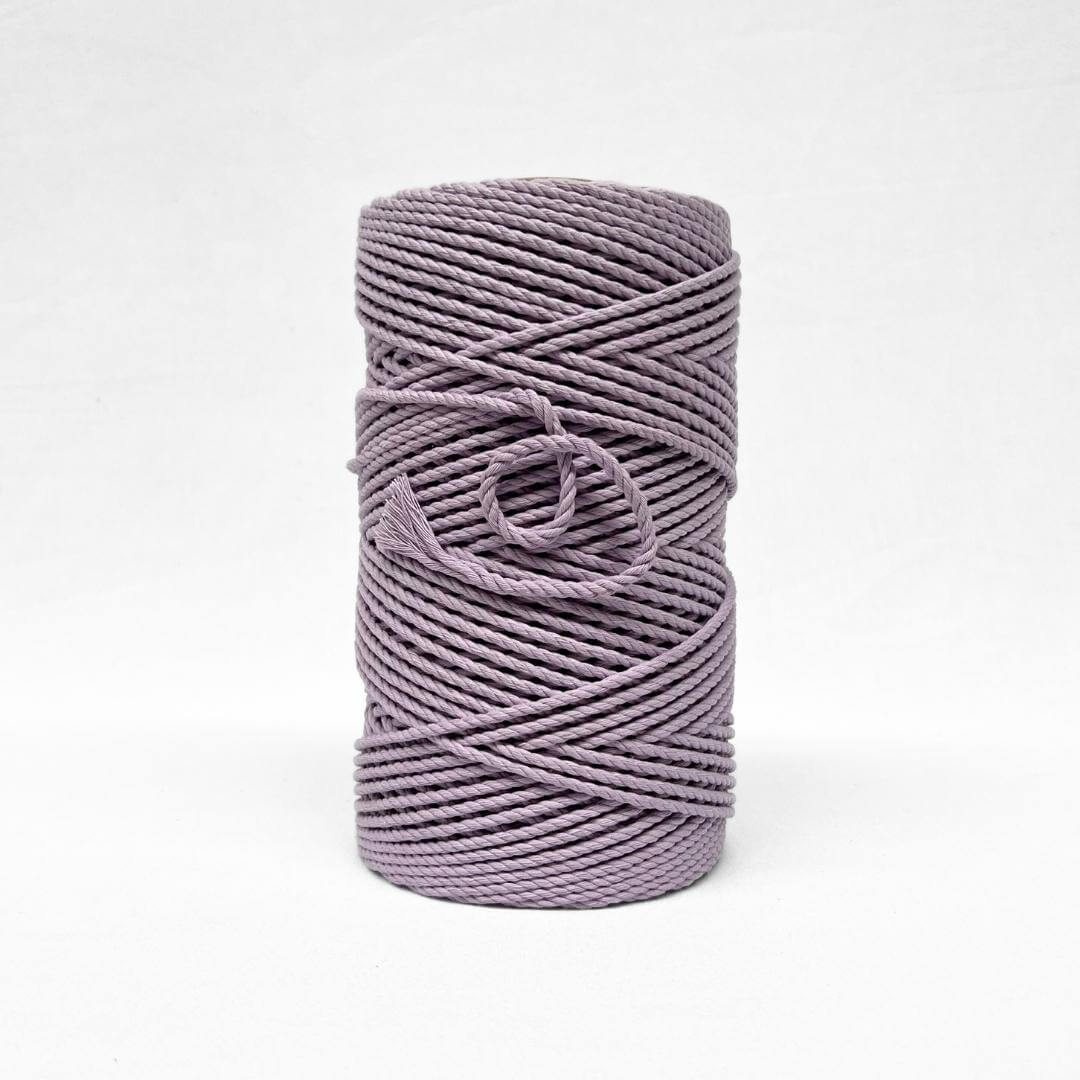 4mm 3ply orchid purple macrame cord standing upright on white background