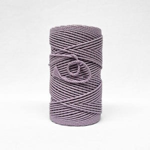 4mm 3ply orchid purple macrame cord standing upright on white background
