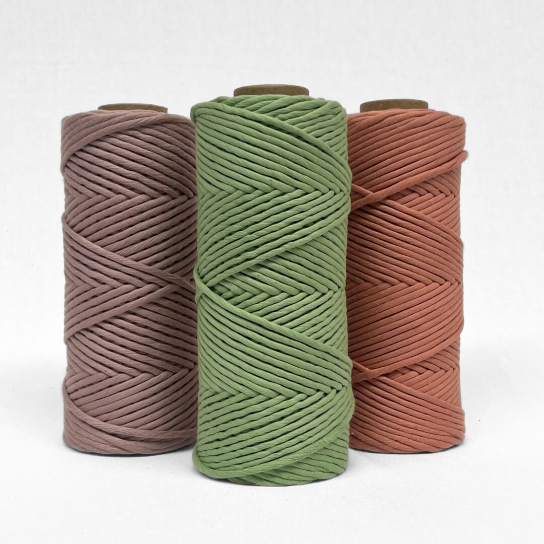 single roll of lemongrass green laying flat on white background