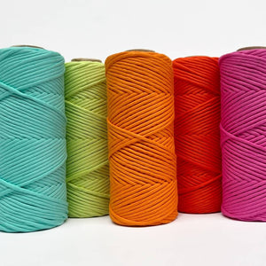 five rolls of various neon colours in our cloud 9 macrame string including mint, green, orange, red and pink