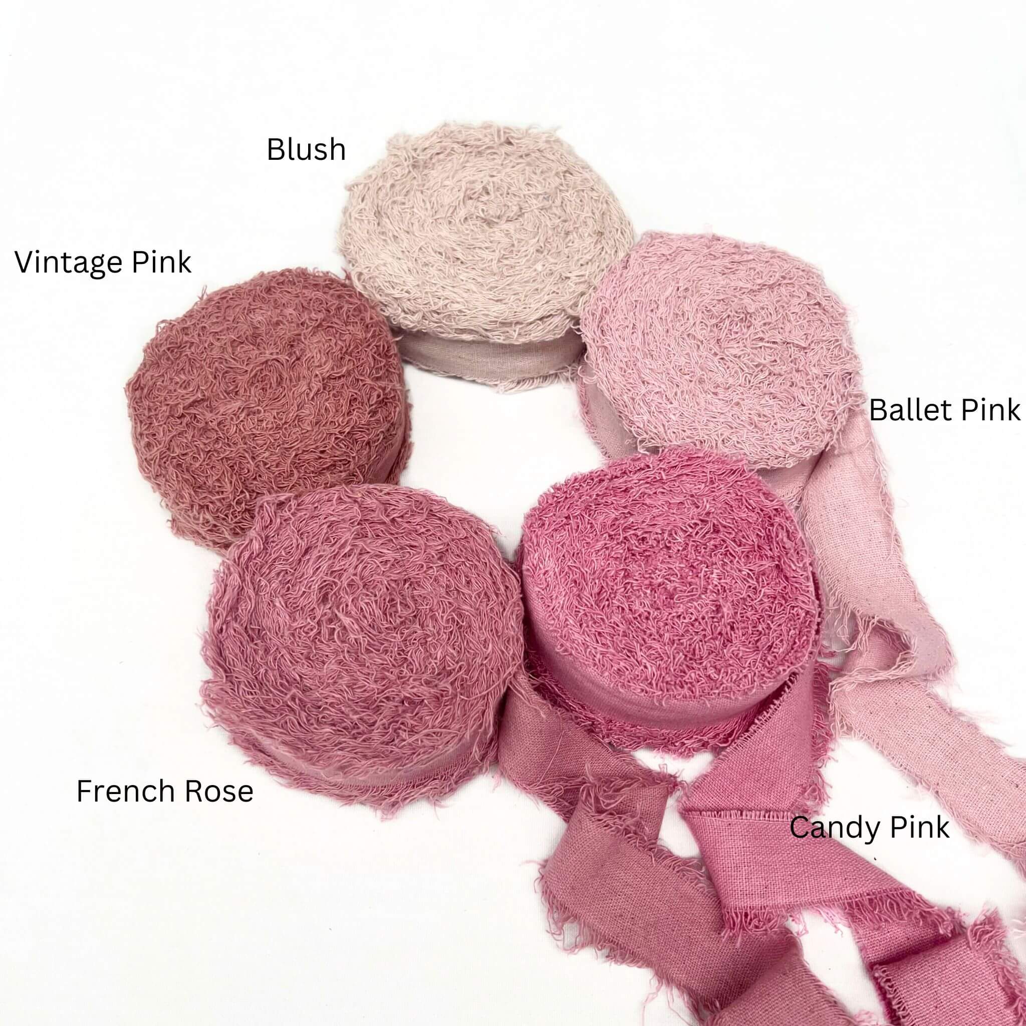 blush ballet pink vibrant pink pink rose vintage pink five colour group photo of cotton frizz ribbon luxury weaving supplies on white back drop