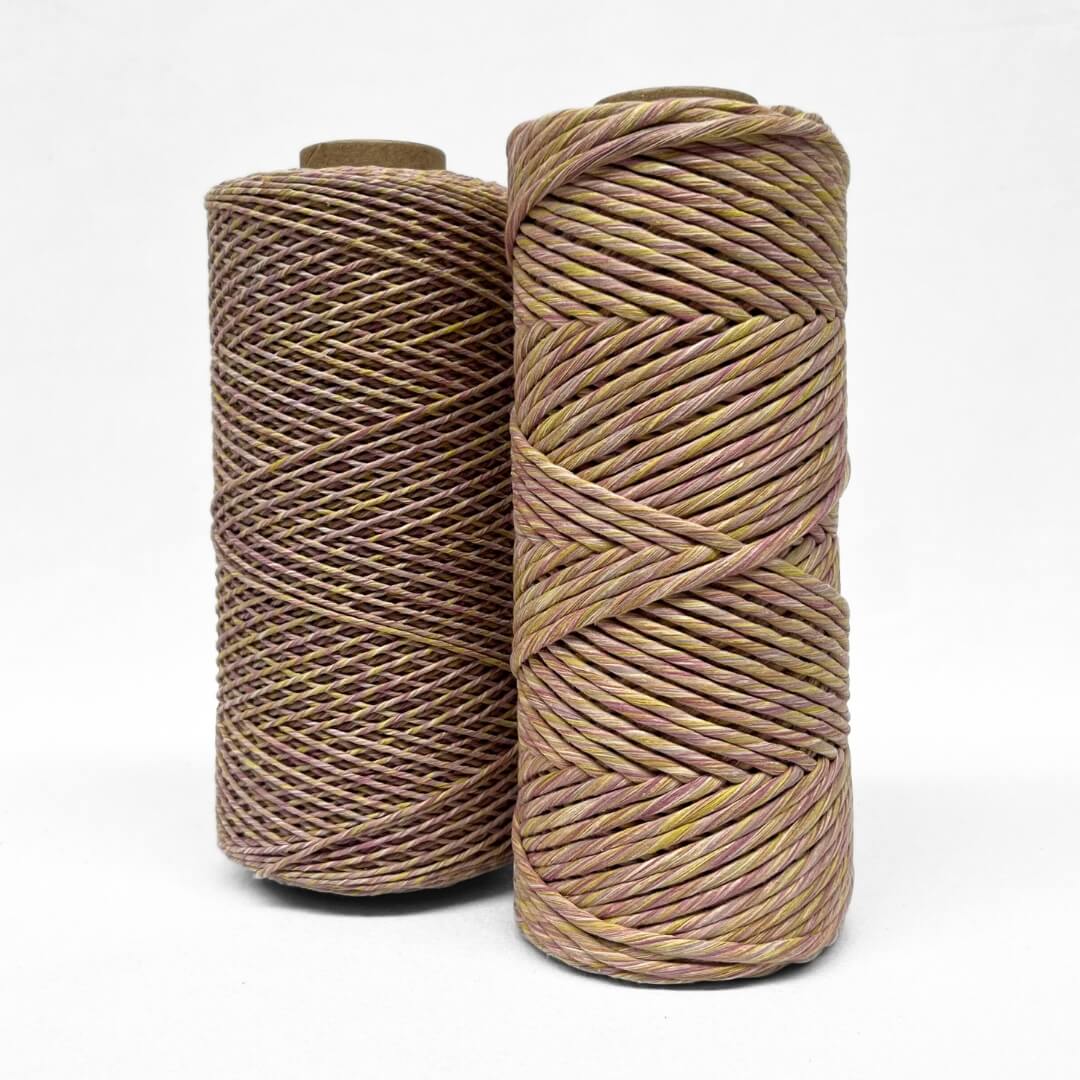 two rolls of mixed cotton string in purple and yellow colour way 1.5 and 4mm options on white background