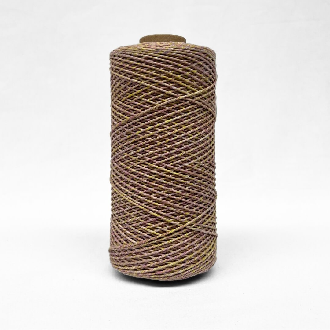 1.5mm warp string in purple and yellow mix colour showing up close detail on white background