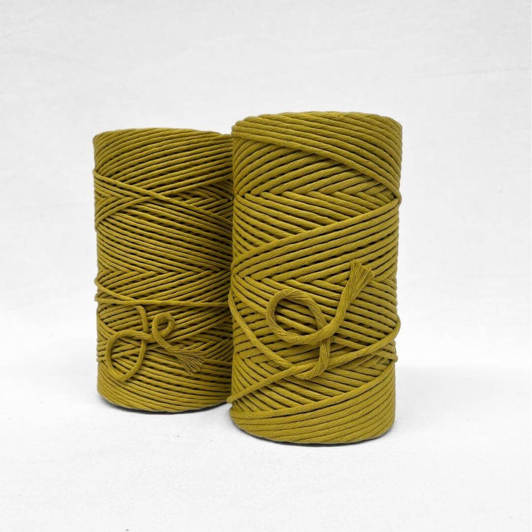 chartreuse cotton string in 3mm and 5mm standing next to each on an angle with white background