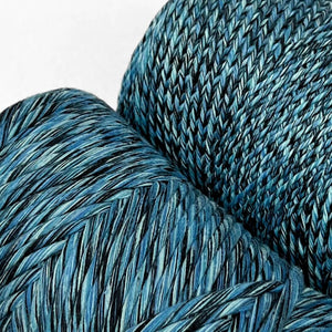 blue and black mixed cotton string close up show casing 4mm and 1.5 options on white wall