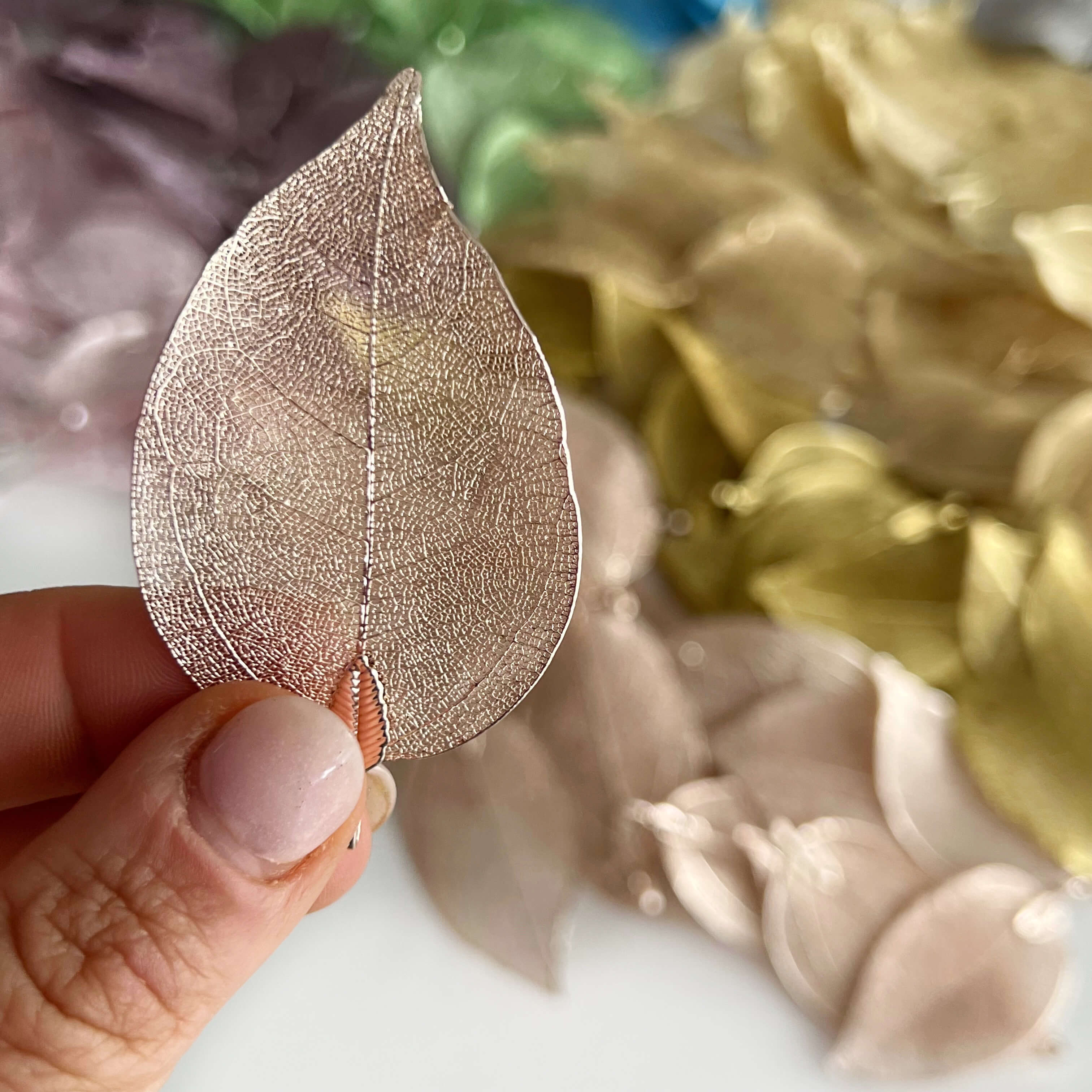 upclose image of intricate detail on filigree leave used for jewellery and craft
