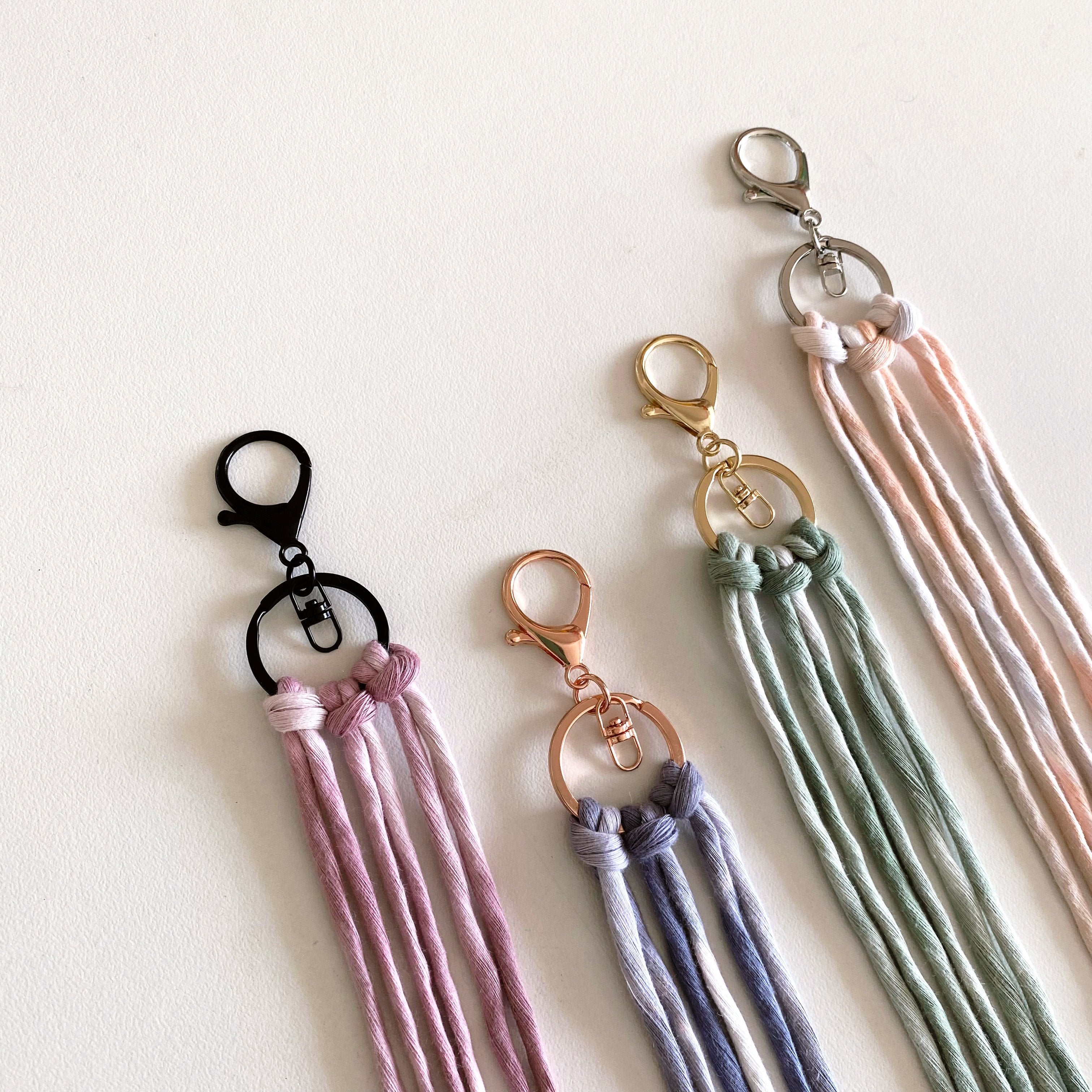 black keyrings laying on table showing difference on colour