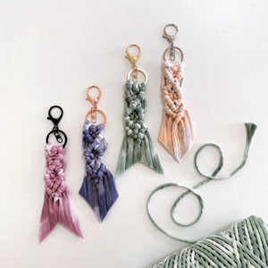 macrame fishtail keyrings laid on angle on white background