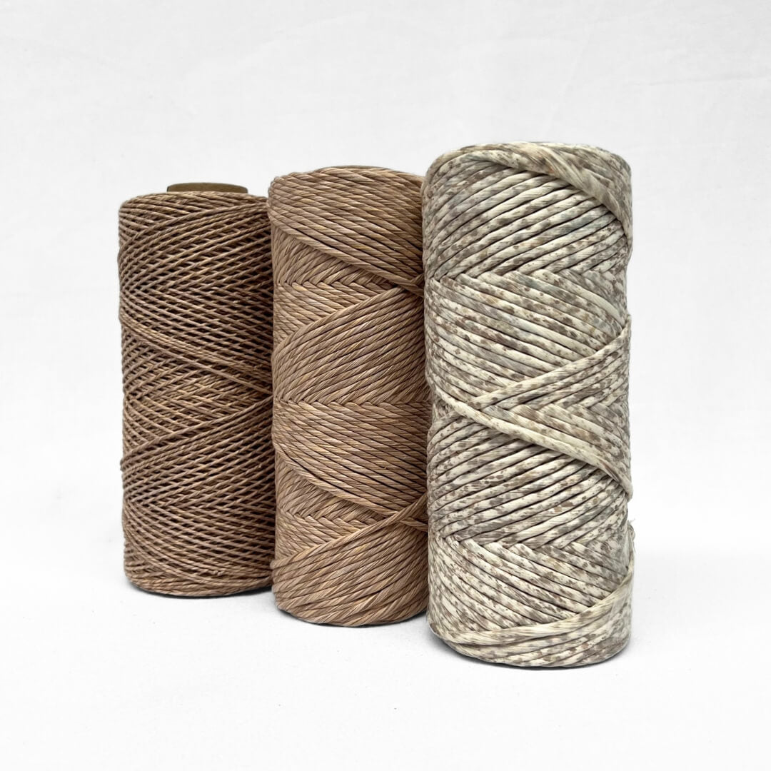 1.5mm 4mm mixed cotton string next to 4mm confetti string in warm brown and grey colour way  500g rolls 