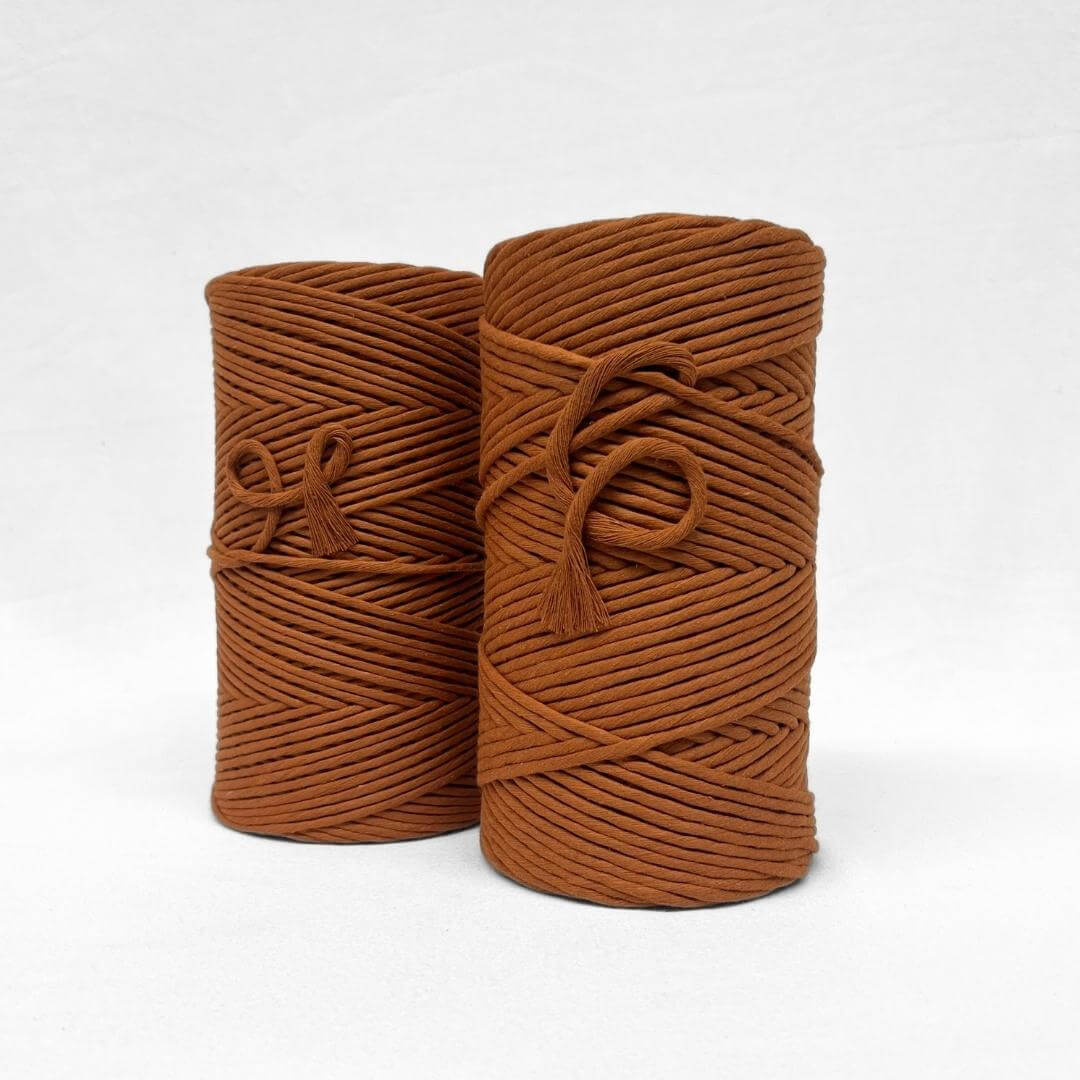 3mm and 5mm warm brown colour on white background small curled piece showing cotton softness