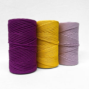 colour comparison photo showing deep purple bright yellow and pastel purple in 5mm cotton string for macrame and diy craft with white background 