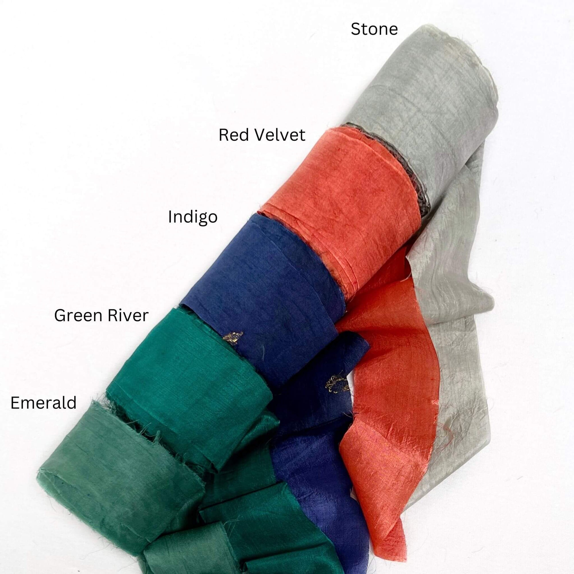 stone grey red indigo deep green emerald wide silk ribbon for luxury gift wrapping on white background 
