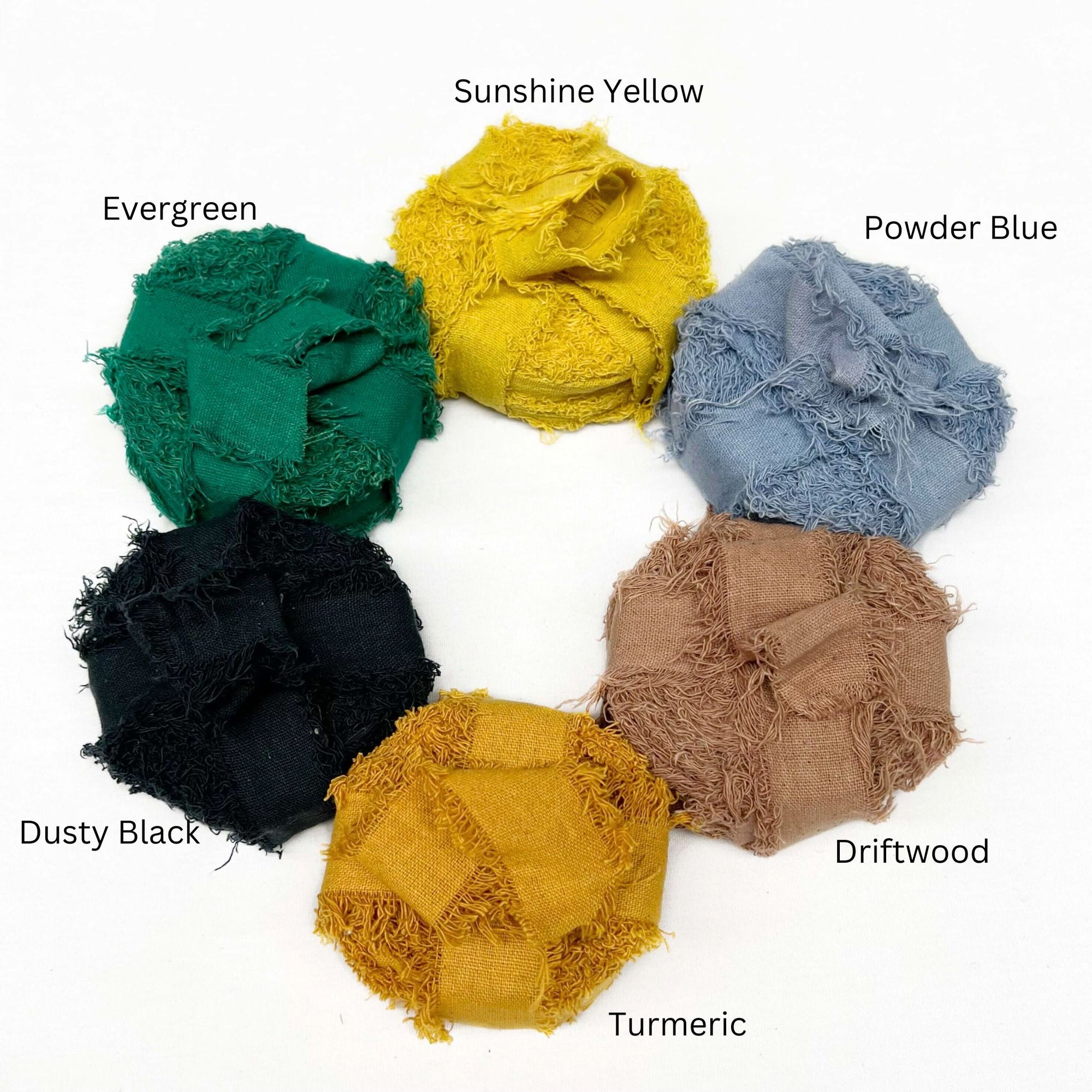 vibrant yellow powder blue driftwood brown mustard yellow black deep green wide cotton frizz group image on white back drop