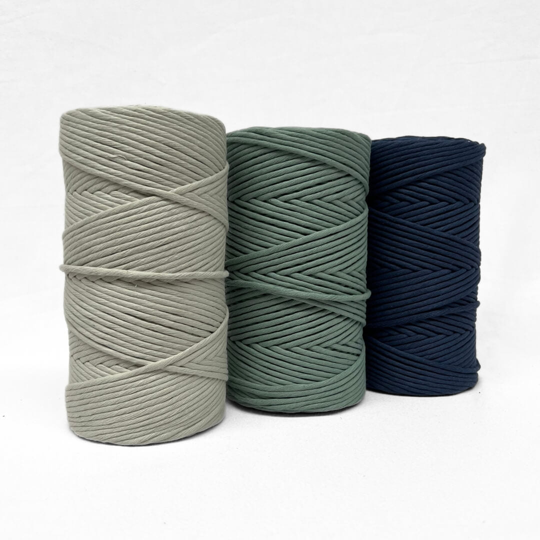 colour comparison image showing mist green medium green and navy blue in 5mm string for macrame on white wall