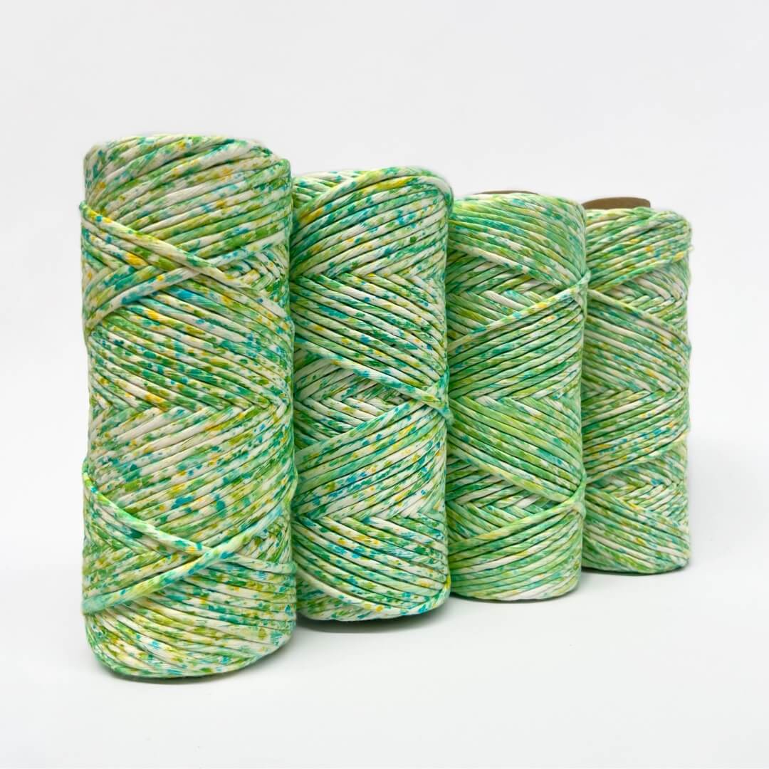 Four rolls of confetti cotton cord in citrus colour way on white background