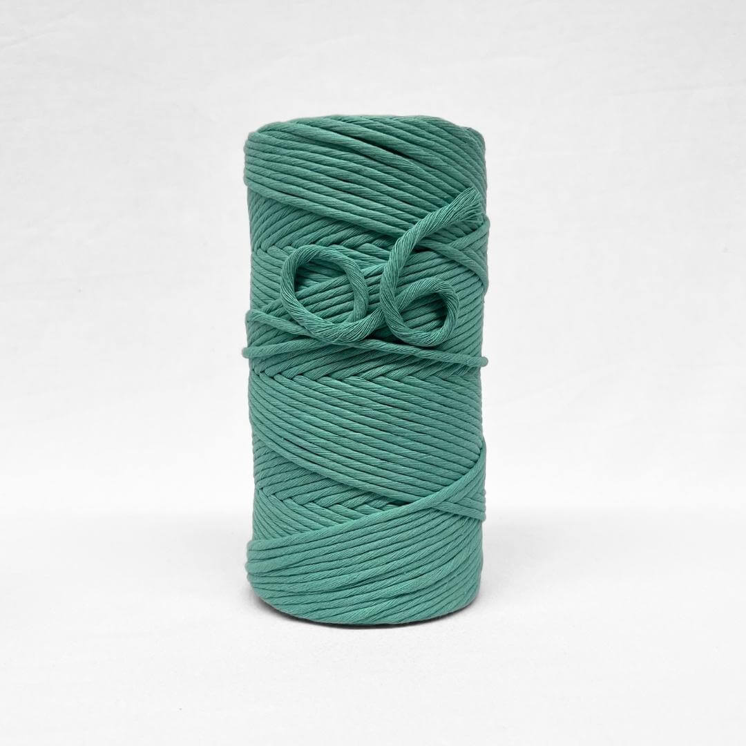 blue turquoise 5mm cotton string for macrame on white wall