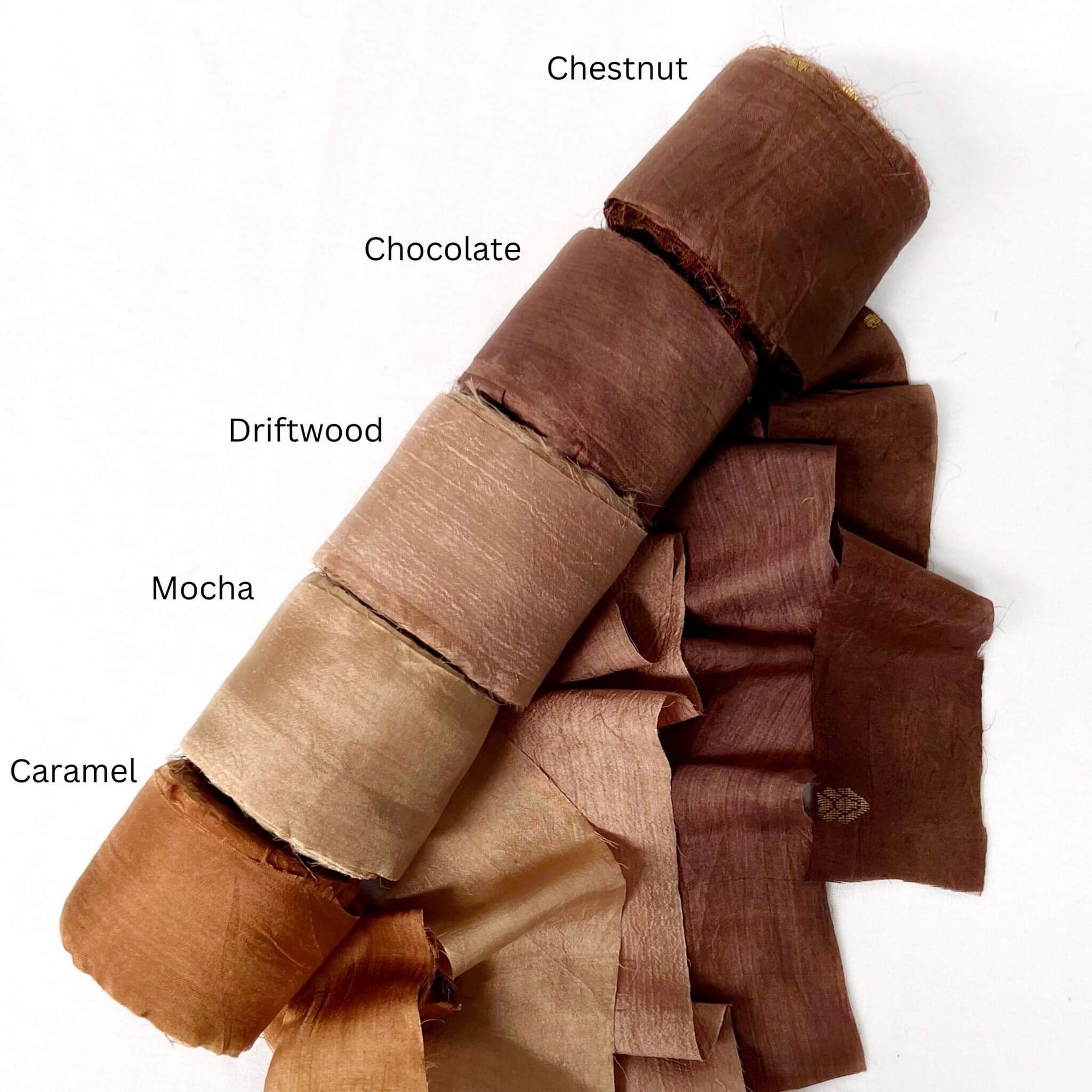chestnut chocolate brown soft brown driftwood mocha caramel group photo of silk ribbon rolls on white background