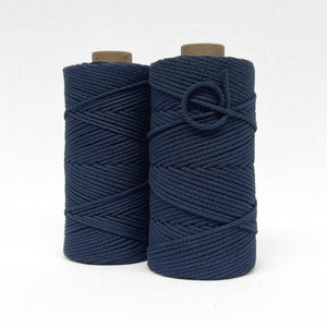 blue turquoise braided 4mm cotton cord standing side by side on white back drop