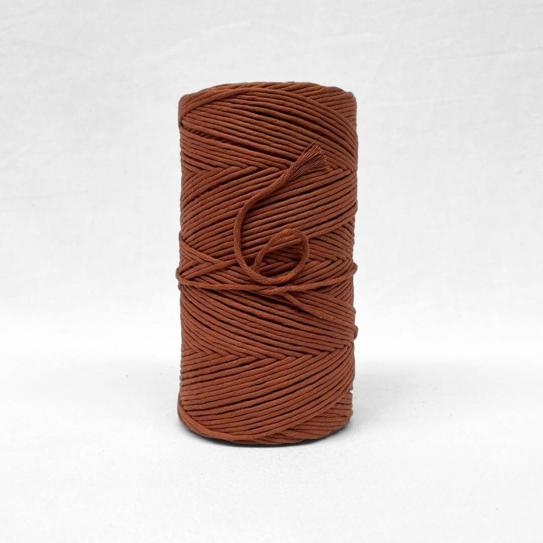 3mm rust cotton cord for macrame and other diy crafts on white background