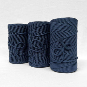 family photo showing rope and string in navy blue on white back ground
