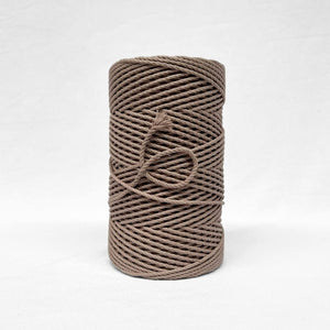 quartz soft brown 4mm rope standing alone on white background with small brushed out piece showing cotton softness