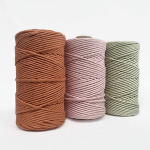 maple orange soft pink light green cotton cord macrame string group photo showing three colours on white wall