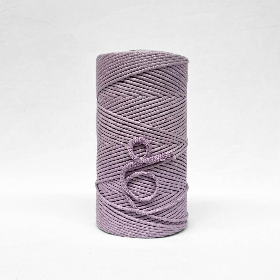 3mm cotton roll in orchid purple on white background for diy macrame craft