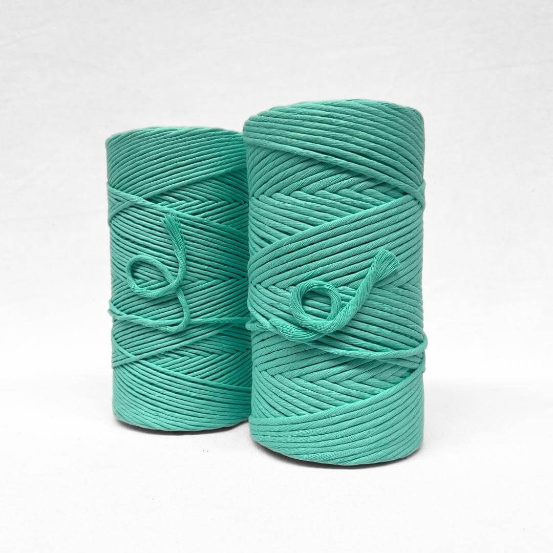 bright ice green in 3mm and 5mm standing next to each other on angle with white background 