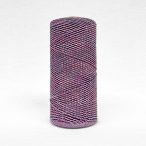 one roll of 1.5mm cotton mixed string standing on white back drop