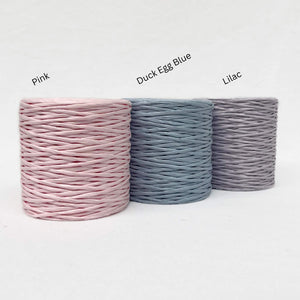 pastel colour combination photo of paper string for card making on white back ground