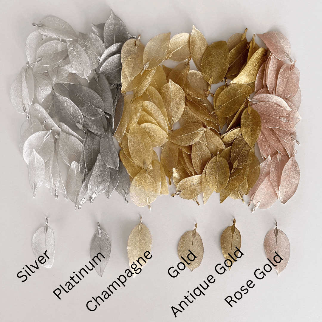 silver platinum champagne gold antique gold and rose gold leaves labelled in a row