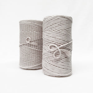 5mm ivory macrame cord placed in front of 3mm natural macrame string