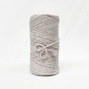 5mm ivory coloured macrame string with soft end brushed out showing individual lengths of fibre