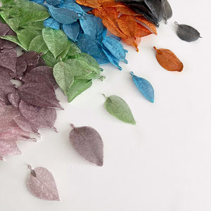 selected colour metal leaves lined up to show difference for craft supplies